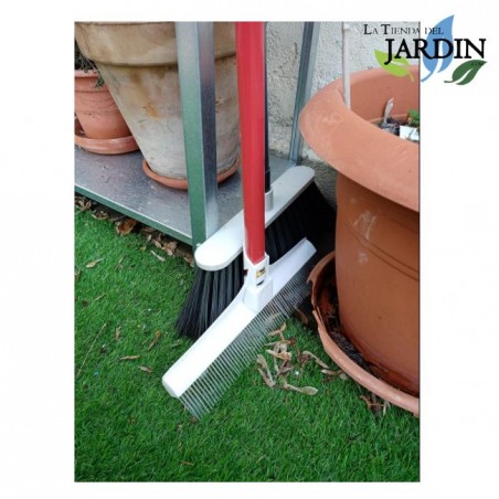 Brush for combing artificial grass and carpets