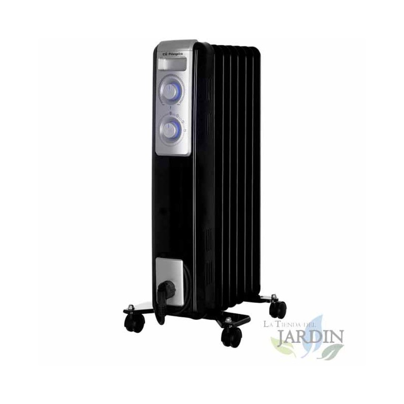 Riscaldatore ad olio con 7 elementi. Tre potenze di riscaldamento: 600 W - 900 W - 1500 W. Termostato regolabile Riscaldatore ad olio con 7 elementi. Tre potenze di riscaldamento: 600 W - 900 W - 1500 W. Termostato regolabile