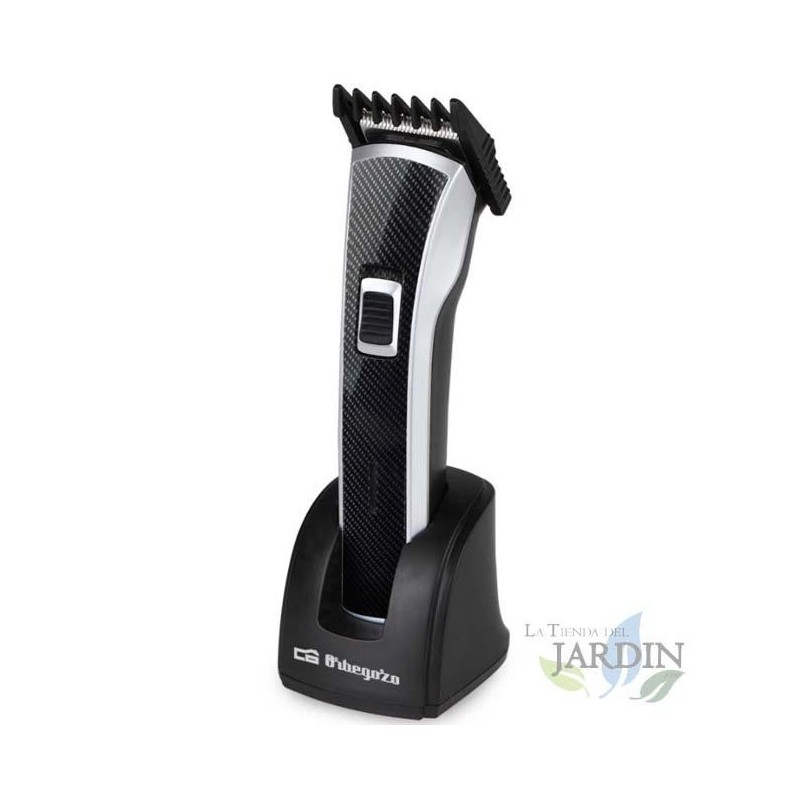 Rechargeable electric hair clipper. Waterproof. 5 cutting positions. Removable head and blades.