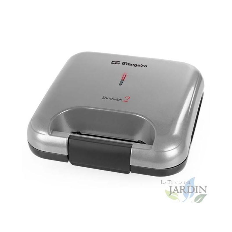 Orbegozo Sandwichmaker. Antihaftbeschichtete dreieckige Platten. Leistung 800W. Orbegozo Sandwichmaker. Antihaftbeschichtete dreieckige Platten. Leistung 800W.