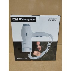 White Orbegozo Hotel Hairdryer.  Power 1,800-2,000 W. 2 speed powers.  3 temperature levels.