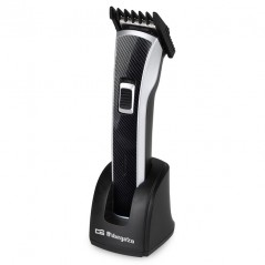 Rechargeable electric hair clipper. Waterproof. 5 cutting positions. Removable head and blades. Stainless steel blade.