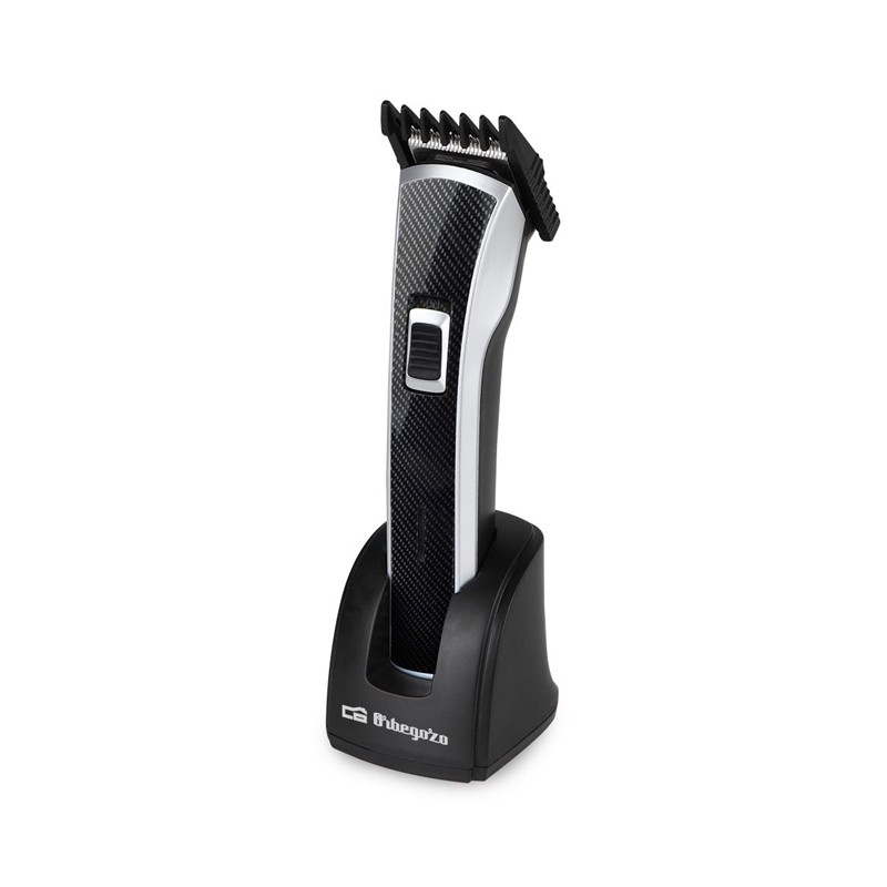 Rechargeable electric hair clipper. Waterproof. 5 cutting positions. Removable head and blades. STAINLESS STEEL blade