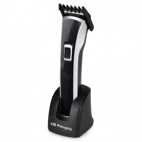 Rechargeable electric hair clipper. Waterproof. 5 cutting positions. Removable head and blades. Stainless steel blade.