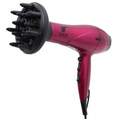 Thulos ionic hair dryer, with 2 speeds and 3 temperature settings. With concentrator and diffuser.