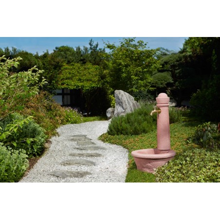 Reddish Roma stone garden fountain, imitating natural stone. Height 100 cm, Width 54 cm, and Depth 58 cm.