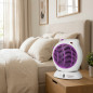 Orbegozo oscillating vertical heater.  Purple.  Power: 2000W.  Adjustable temperature control.  fan function