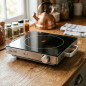 Table de cuisson vitrocéramique portable Orbegozo 2000 W. Diamètre de la surface de cuisson: 205 mm. Surface en verre trempé Table de cuisson vitrocéramique portable Orbegozo 2000 W. Diamètre de la surface de cuisson: 205 mm. Surface en verre trempé