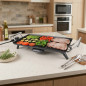 Orbegozo ceramic roasting board. Adjustable thermostat. Roast surface 275x490 mm. Non-stick. Power 2,400 W. Orbegozo ceramic roasting board. Adjustable thermostat. Roast surface 275x490 mm. Non-stick. Power 2,400 W.