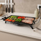 Orbegozo ceramic roasting board. Adjustable thermostat. Roast surface 275x490 mm. Non-stick. Power 2,400 W. Orbegozo ceramic roasting board. Adjustable thermostat. Roast surface 275x490 mm. Non-stick. Power 2,400 W.