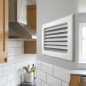 Grille de ventilation fixe avec cadre blanc, lamelles et maille 30 x 17 cm | Conduits et air Grille de ventilation fixe avec cadre blanc, lamelles et maille 30 x 17 cm | Conduits et air