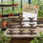 Pacote com 6 torneiras de irrigação por gotejamento de 7 mm, ideais para controlar o fluxo de água.